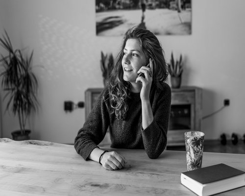 Person holding smartphone at a comfortable distance